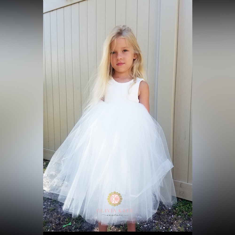 Custom made flower girl dress from Etsy. Never worn.